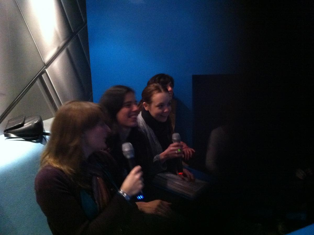 Photo of the lab group sitting with drinks 