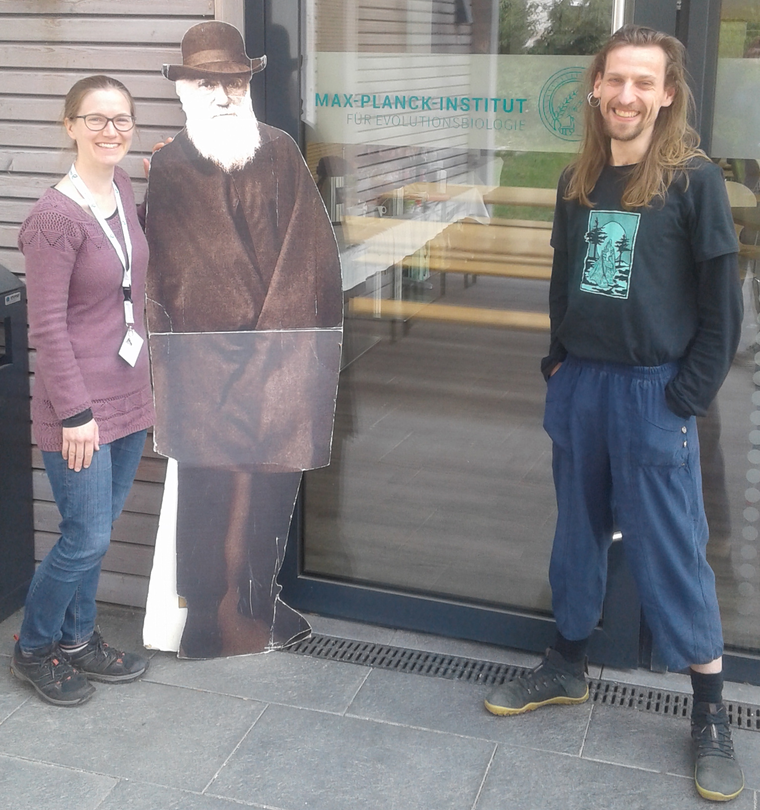 Group members with a life-size cardboard cut-out of Darwin