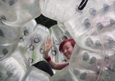 Woman inside inflatable cell structure at Shape image workshop