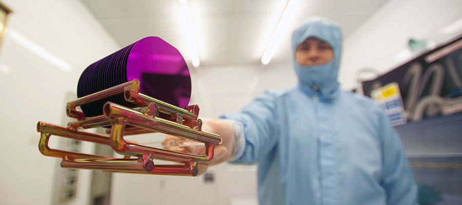 Photo of a technician working in a lab